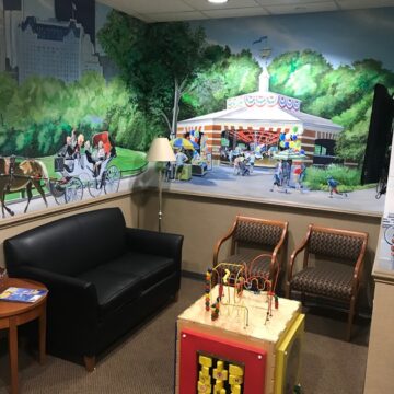Black sofa and chairs at the waiting area of dentistry