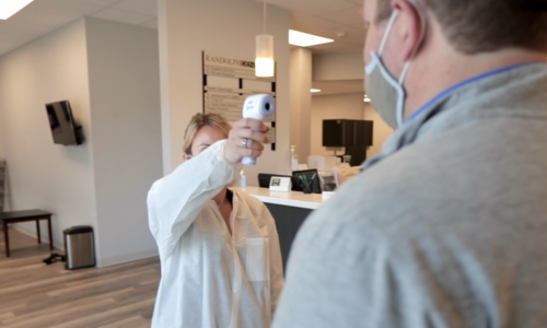 Dental Staff following COVID-19 safety precautions